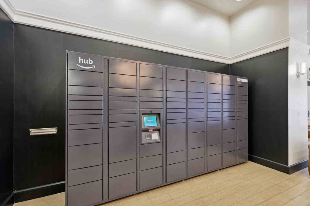 a large set of lockers in a lobby of a building