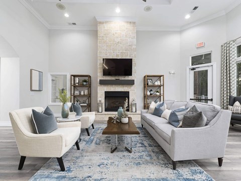 A living room with a fireplace and a couch.