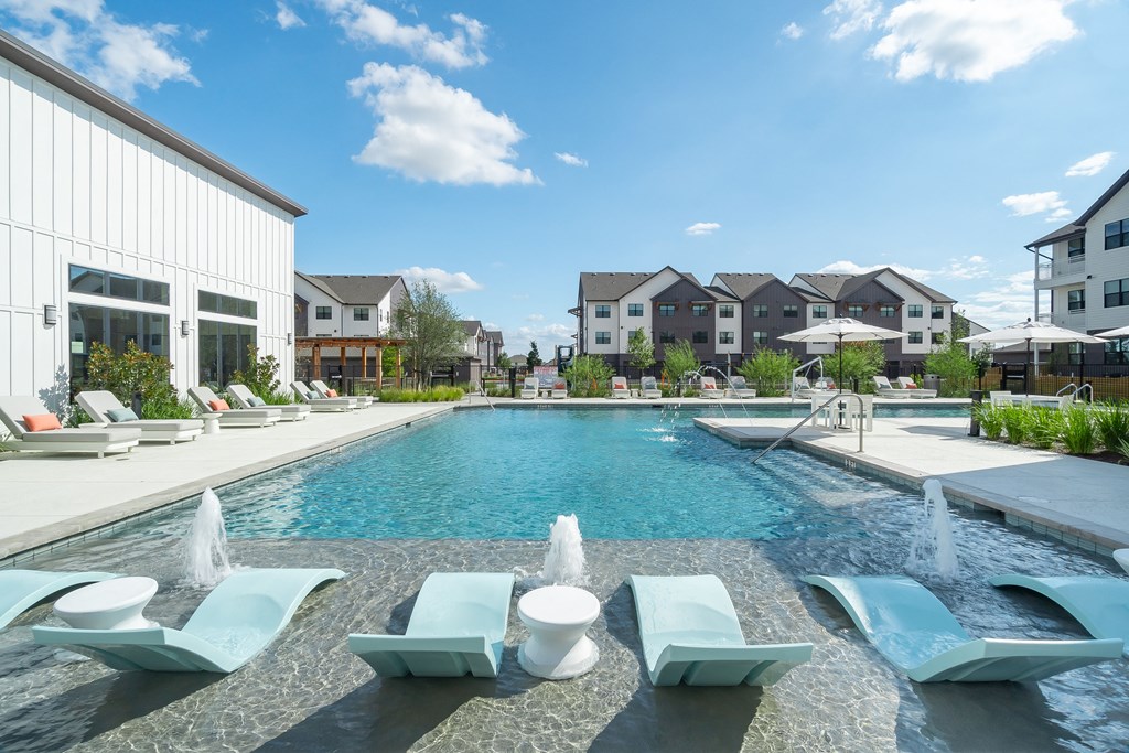 take a dip in the resort style pool at villas at houston levee west apartments