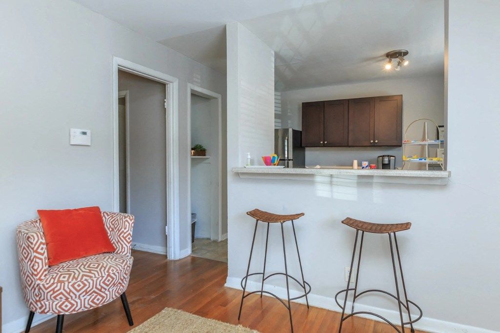 a kitchen and living room in a 555 waverly unit