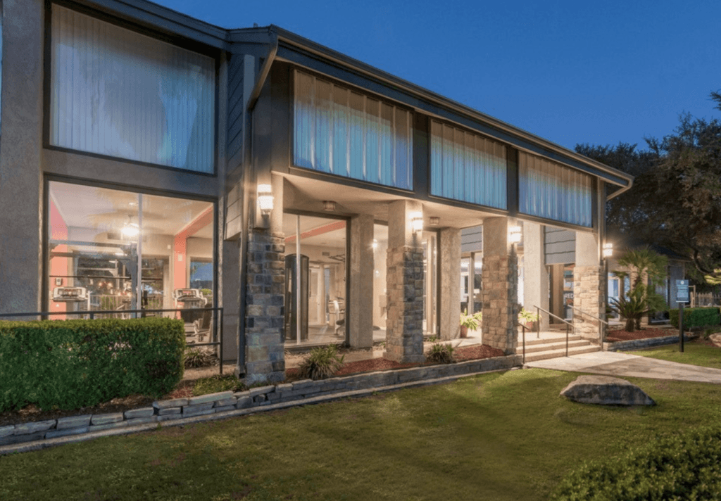 a house with a lawn in front of it