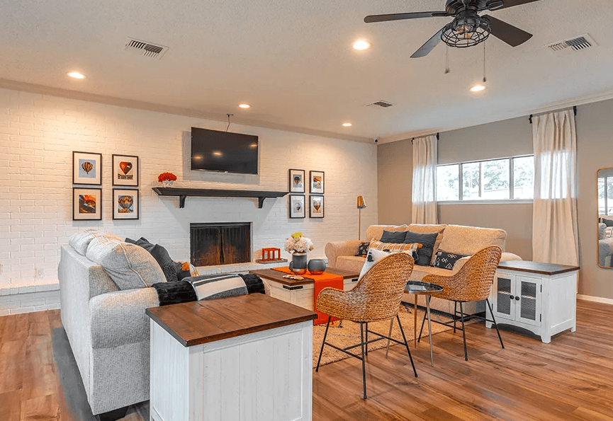 a living room with a couch and a table