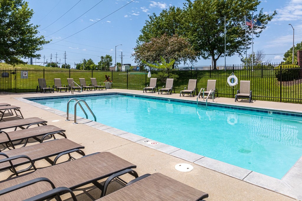 our apartments have a swimming pool with chairs