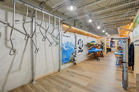 A gym with a sign that says "The Edge" on it.