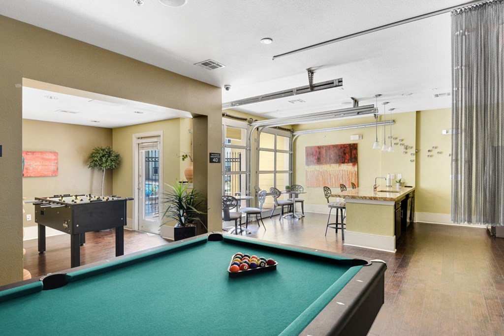 a billiards table in a room with a pool table