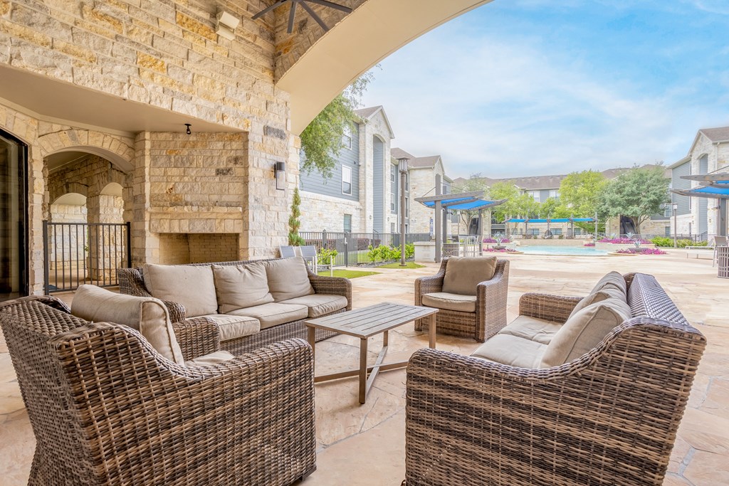 the preserve at ballantyne commons clubhouse patio with wicker furniture