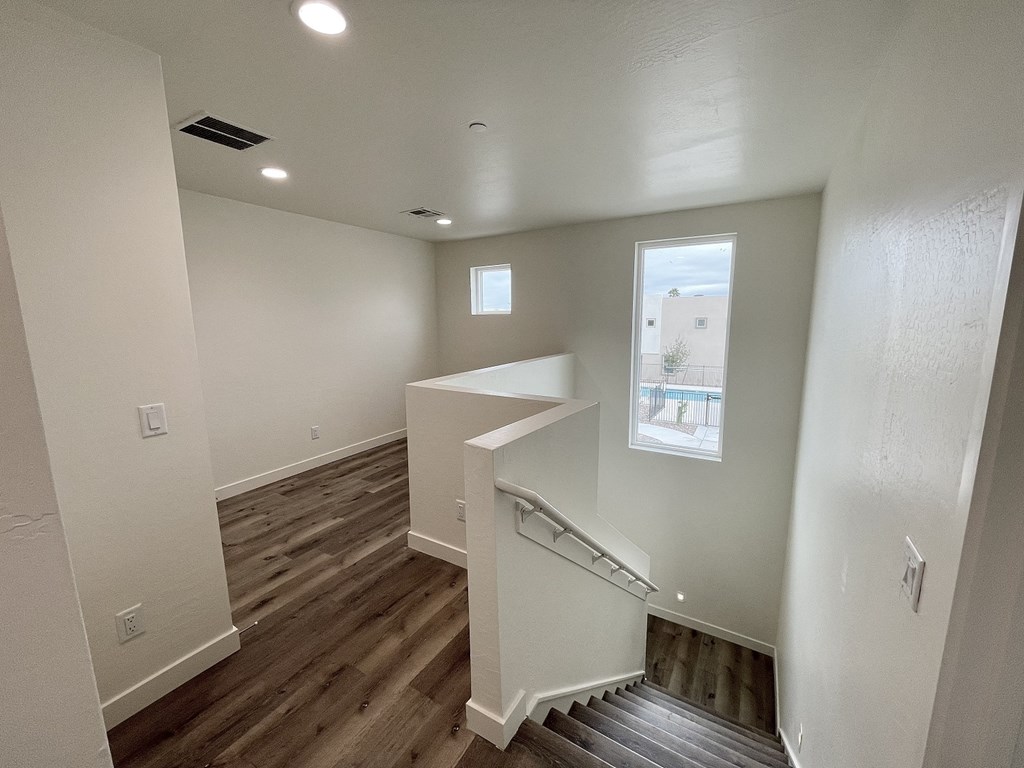 a view from the top of the ceiling of a room with white ceilings and white