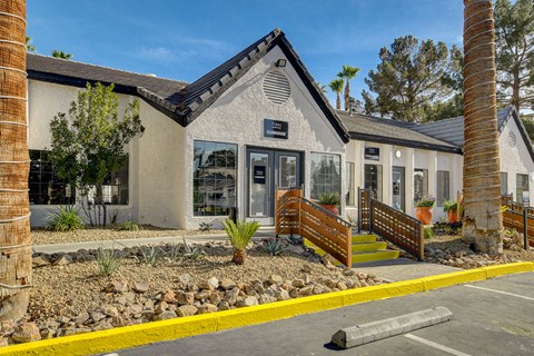 a picture of the front of the building with a blue sky in the background