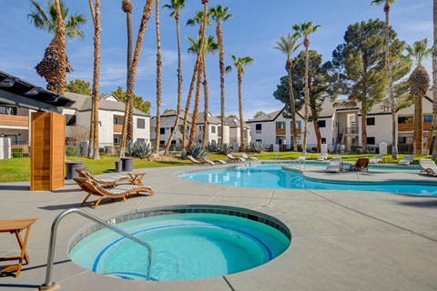 take a dip in the hot tub at villas at houston levee west apartments in