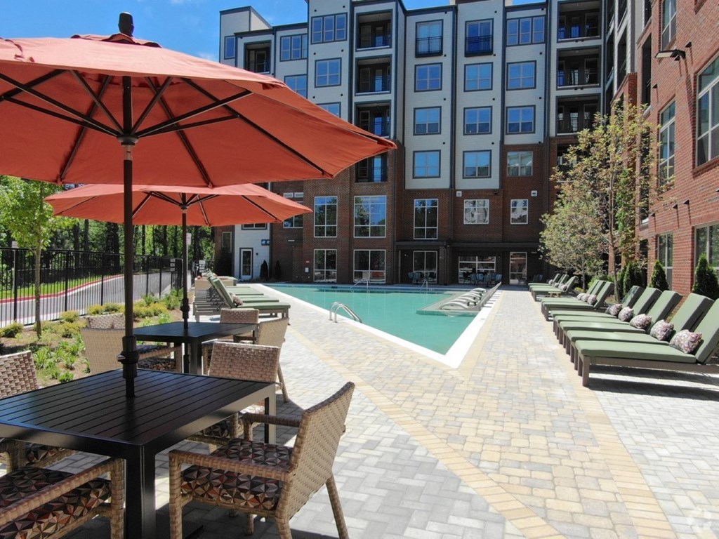 pool side with umbrella shade