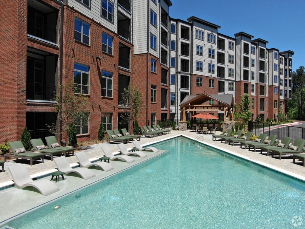 pool side with lounge chairs