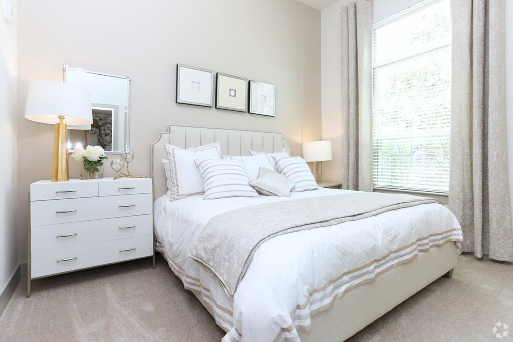 master bedroom with white comforter set
