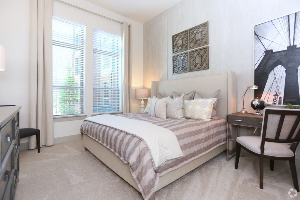 guest bedroom with red stripe comforter
