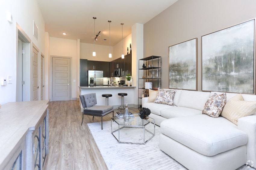 living room with white sofas