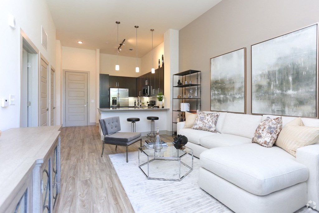 living room with white sofas