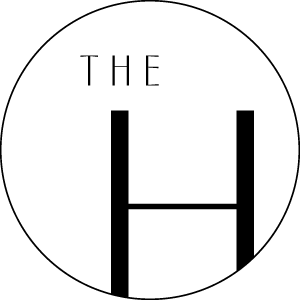 A black and white image of a letter H with the word "THE" above it.