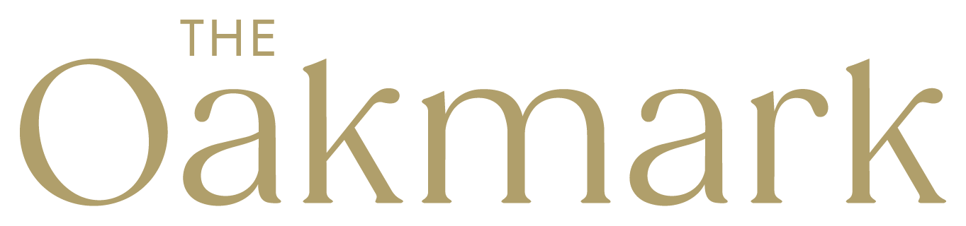 The text "The Oakmark" is displayed in gold on a black background.