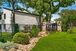 a house with a sign in front of it