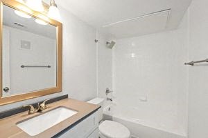 a bathroom with a sink toilet and bathtub