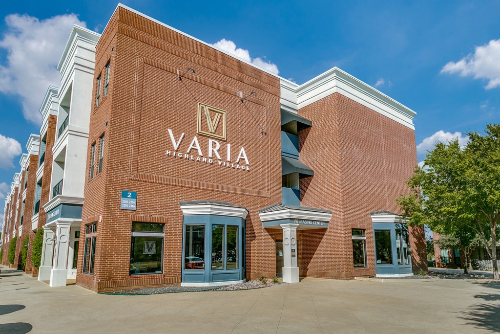 a brick building with a varia physiotherapy center on the side