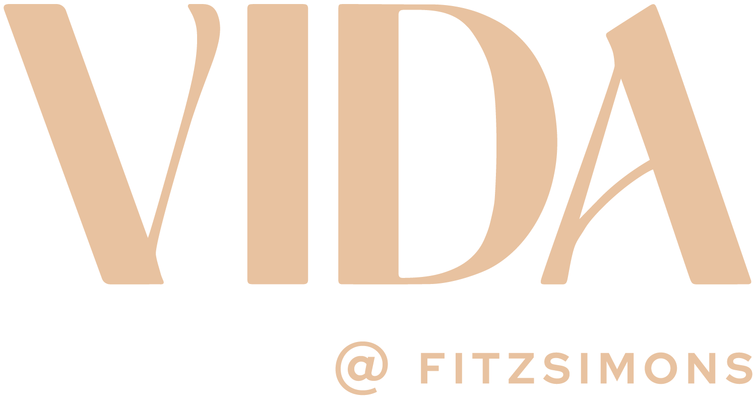 A logo with the word "VIDA" and the handle "@ FITZSIMONS" below it.