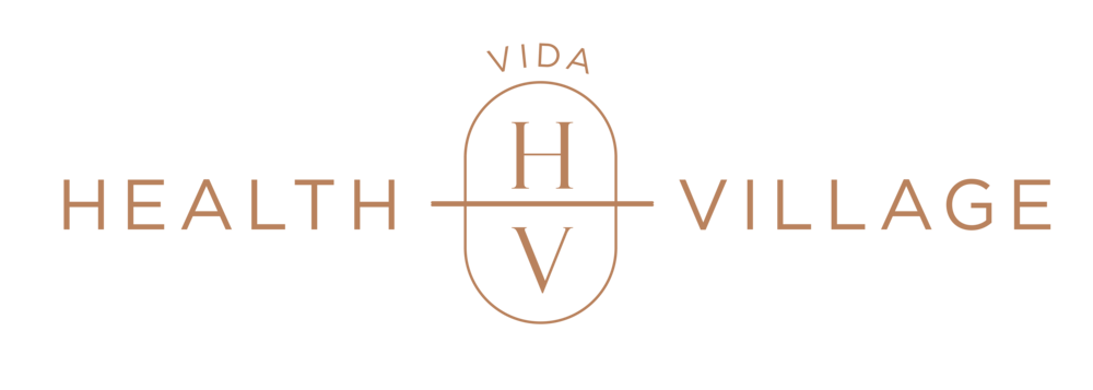 the logo for the vida health village with a vatican cross