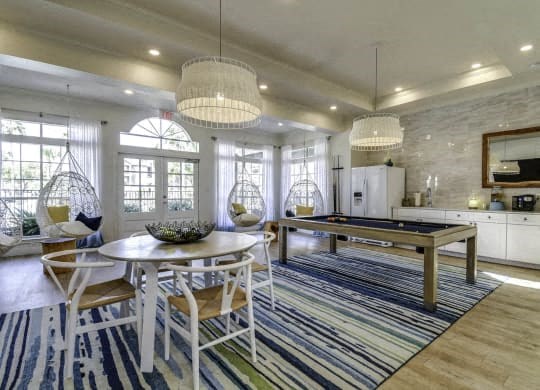 a large room with tables and chairs in it