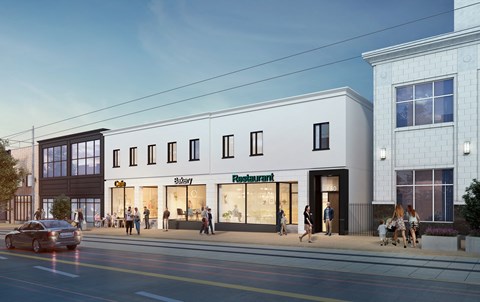 A street view of a building with a restaurant on the ground floor.