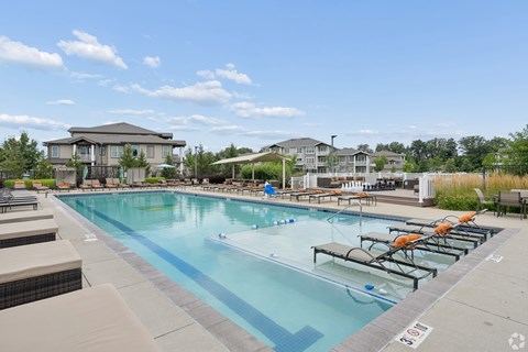 A swimming pool with a person swimming in it.
