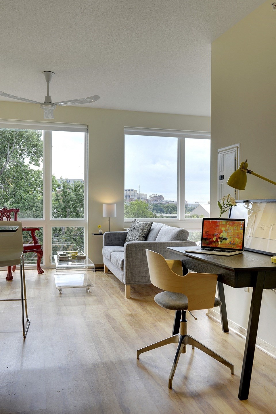 Oversized windows facing East in the Flat D, studio floor plan at Coze Flats