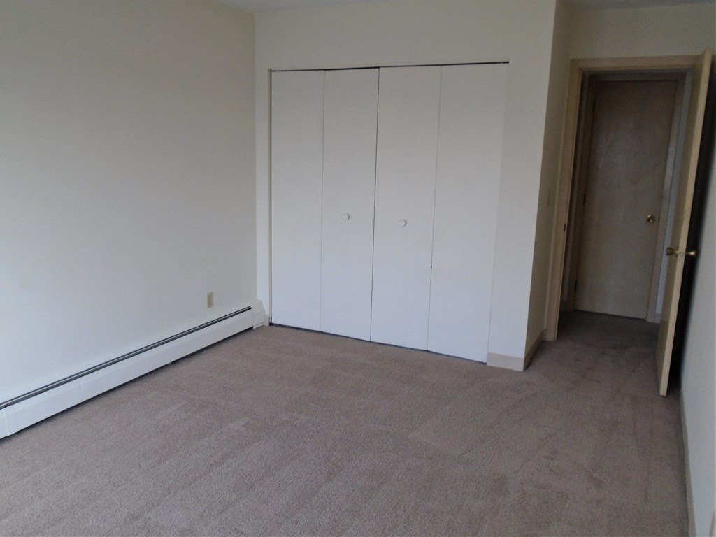 Bedroom photo showing closed closet at John Snell Apartments