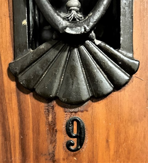 a close up of a door with a number 9 on it