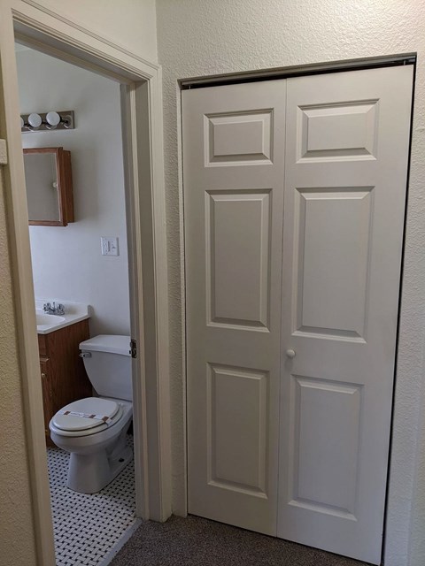 an overhead view of a bathroom with a toilet and sink