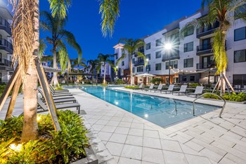 Gorgeous pool in the evening at 19 South Apartments in Kissimmee, Florida - Photo Gallery 6