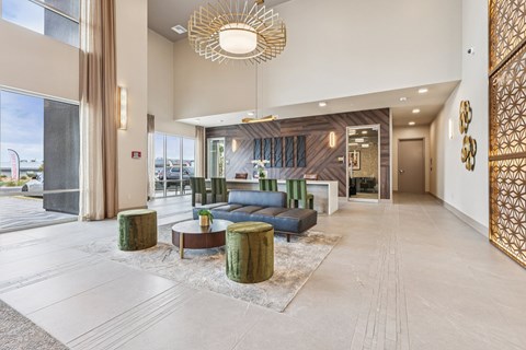 A modern living room with a large window and a view of the outside.