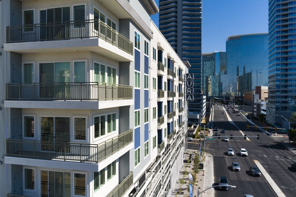 a view of a city street with tall buildings at Aura Vegas Apartments, Nevada