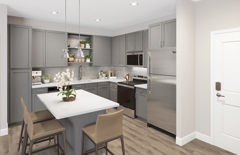 A modern kitchen with a dining table and chairs.