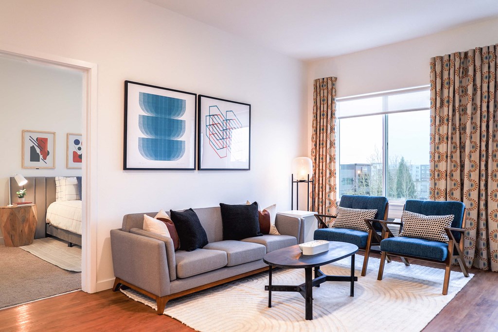Two Bedroom Model Living Room Area with Window View at Hana Apartments, Hillsboro, Oregon