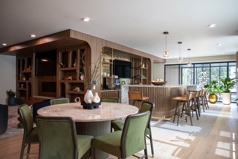 Dining area with marble table and kitchen bar at Montage Apartments, Oregon, 97223