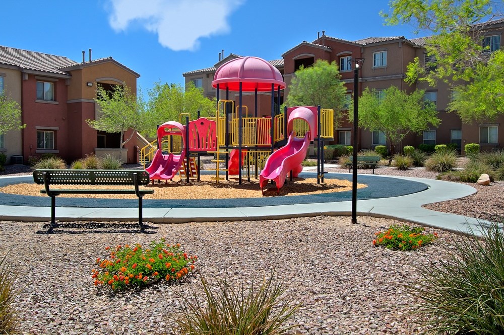 a playground at the preserve at polo towers apartments