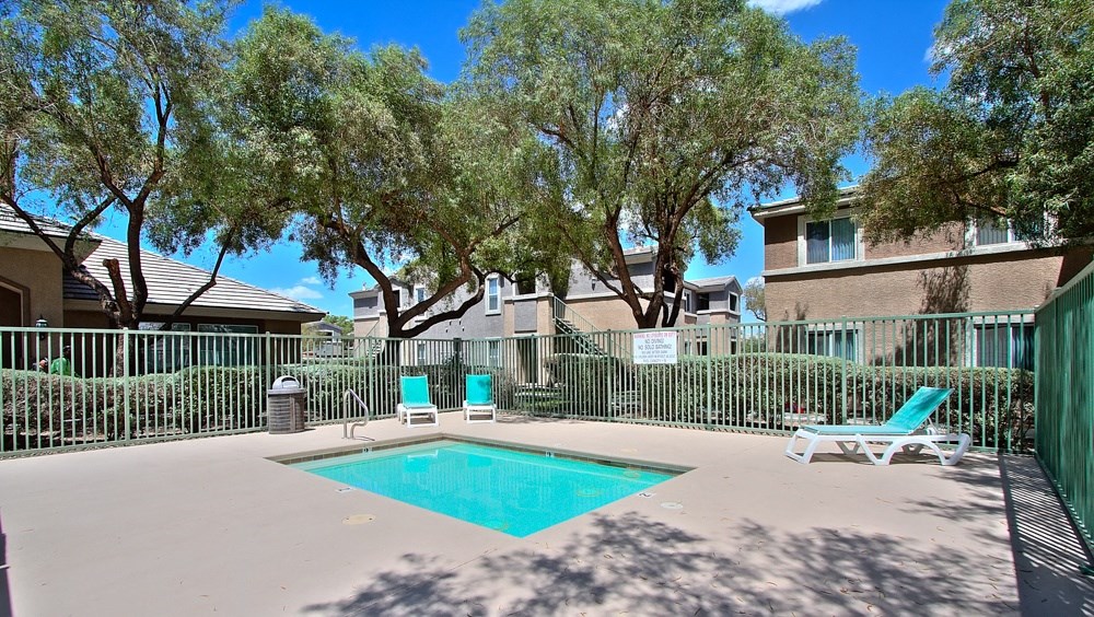 the swimming pool at the preserve at polo apartments tx