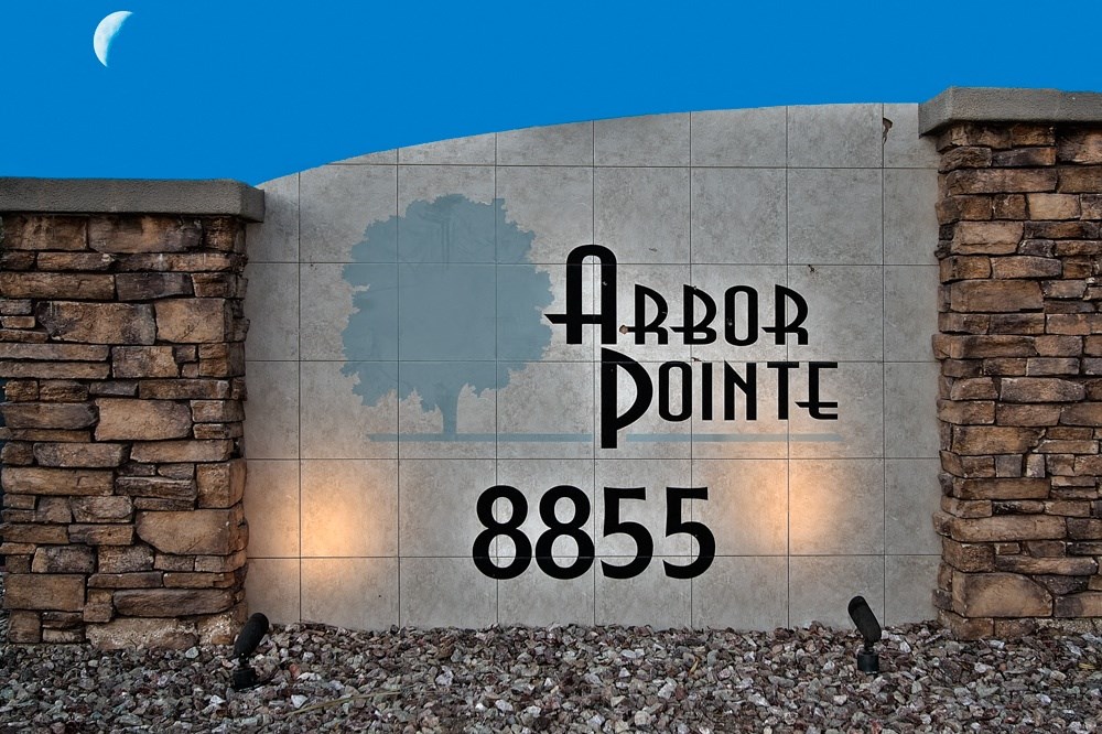 a stone wall with arbor point etched in it on a building