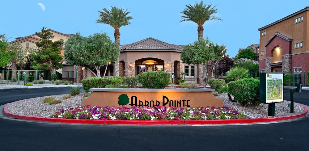 the sign at the front of the eldon donut with a building behind it