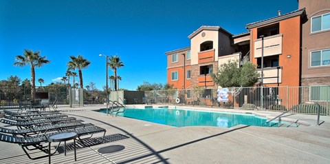 our apartments have a resort style pool with chaise lounge chairs
