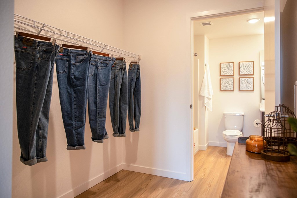 a row of jeans hanging on a rack in a bathroomat Scouter's Mountain, Happy Valley Oregon