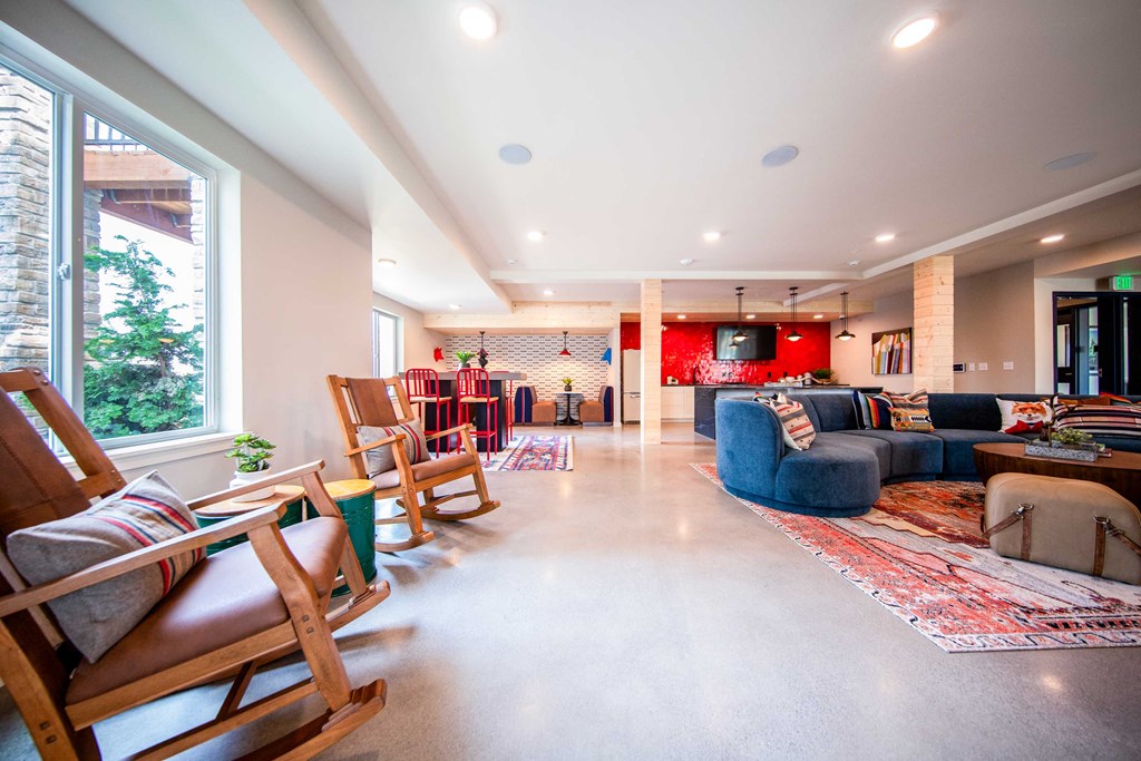 a living room with a couch and chairsat Scouter's Mountain, Happy Valley, 97086