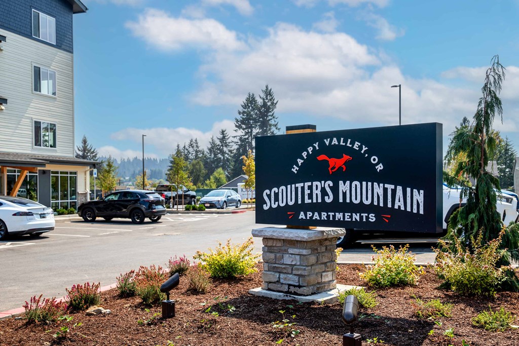 a sign for the scotts mountain apartmentsat Scouter's Mountain, Happy Valley, OR 97086