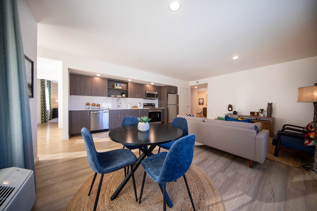 a living room with a table and chairs and a kitchenat Scouter's Mountain, Happy Valley, 97086