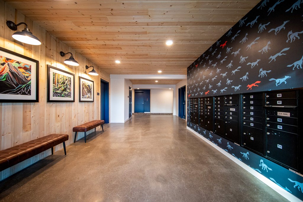 a hallway with a large wall of closets and benchesat Scouter's Mountain, Happy Valley