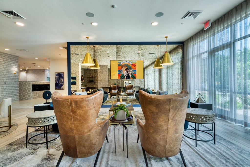Community seating area in resident clubhouse at The Rey Downtown, Phoenix, AZ